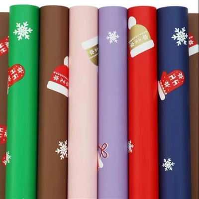 Bom preço. Papel de envolvimento 58cm x 58cm da flor do presente do Natal 20 folhas no saco on-line