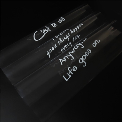 Bom preço. 20 OPPs espessados de papel de embrulho de flores transparente à prova de água e poeira popular com letras em inglês e papel de vidro para buquês de rosas on-line