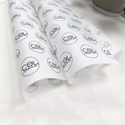Bom preço. Papel de embrulho de tecido personalizado com buquê impresso para embalagem de presente de roupas on-line