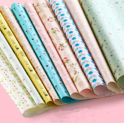 Bom preço. 52cm*72cm Papel de embrulho de presente Rolo de papel OEM/ODM Embalagem Folha de embalagem on-line