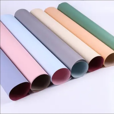 Bom preço Mais de 50 cores Papel de embrulho de flores de plástico 58 * 58cm Para embrulho de sabão Ouya on-line