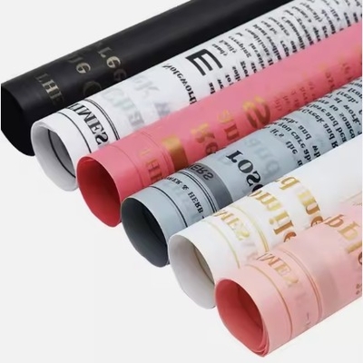 Bom preço. Letras inglesas Logotipo da marca impresso Papel de tecido personalizado Padrão personalizado Texto de flores Pacote de papel Papel de embrulho de presente on-line