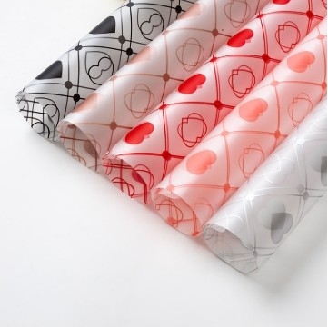 Bom preço. Papel de embrulho de flores OPP em várias cores perfeito para lojas de flores e presentes on-line
