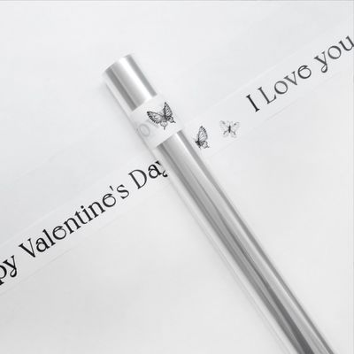 Bom preço. Papel de embrulho de flores romântico Rolo de celulosa transparente OPP para embalagem DY 57*1000cm on-line