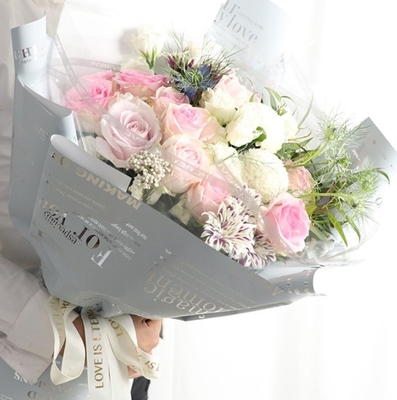 Bom preço. Papel de embrulho de flores de celófano inglês espessado de 5,8 fios totalmente transparente, material de arte floral da florista on-line